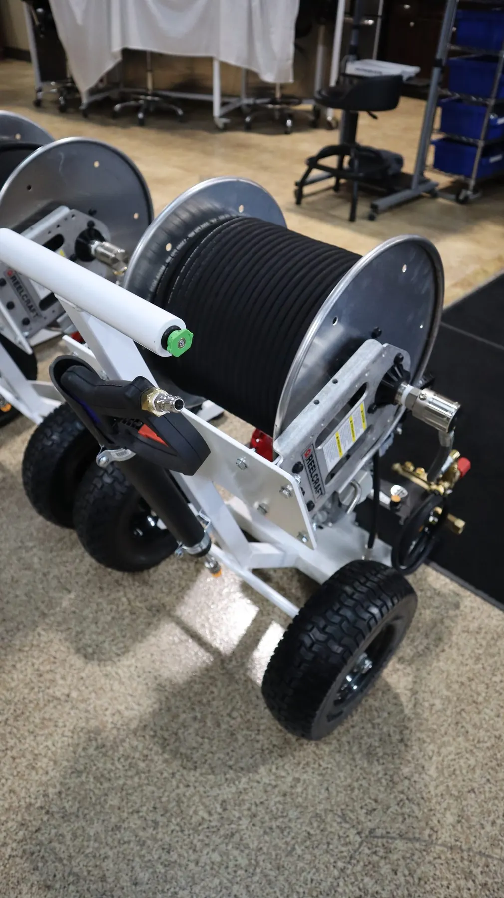 Portable pressure washer hose reel and trigger handle