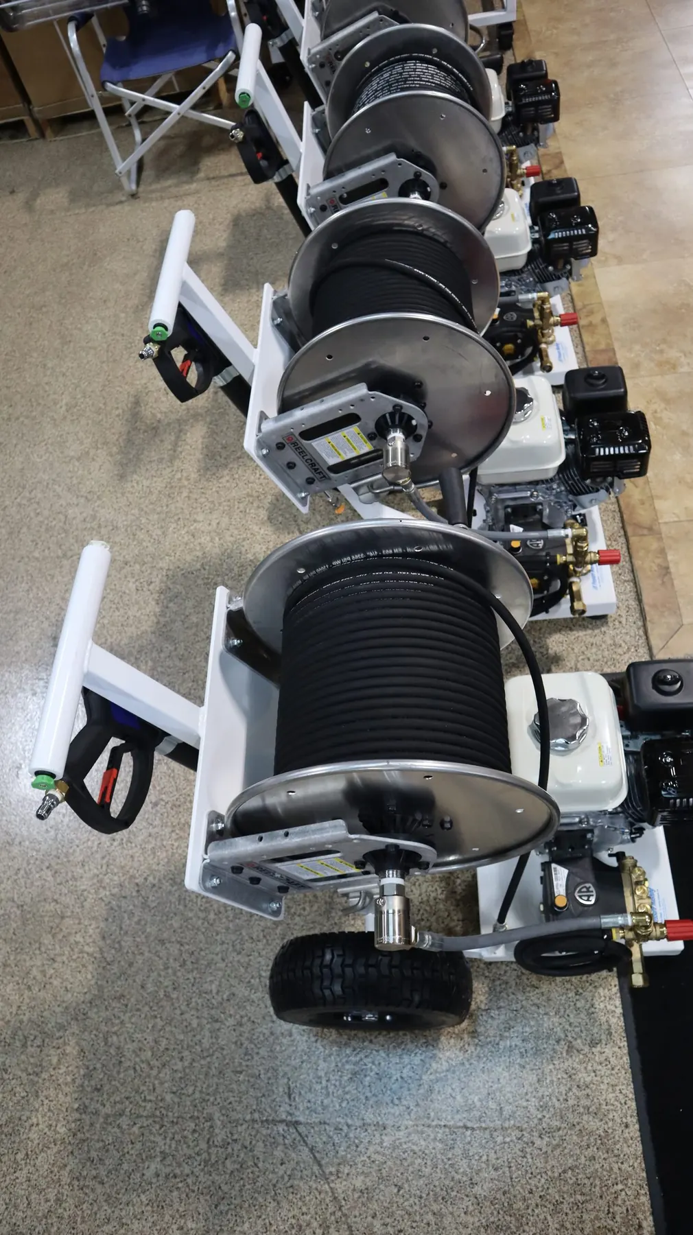 Portable pressure washer units lined up