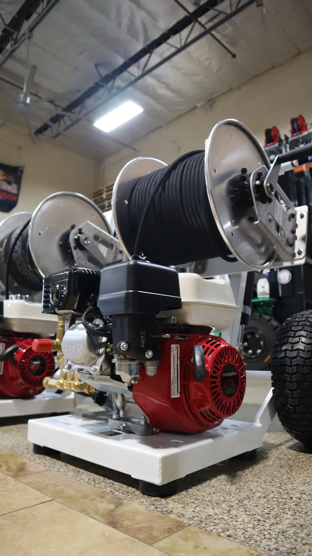 Portable pressure washer engine and reel closeup