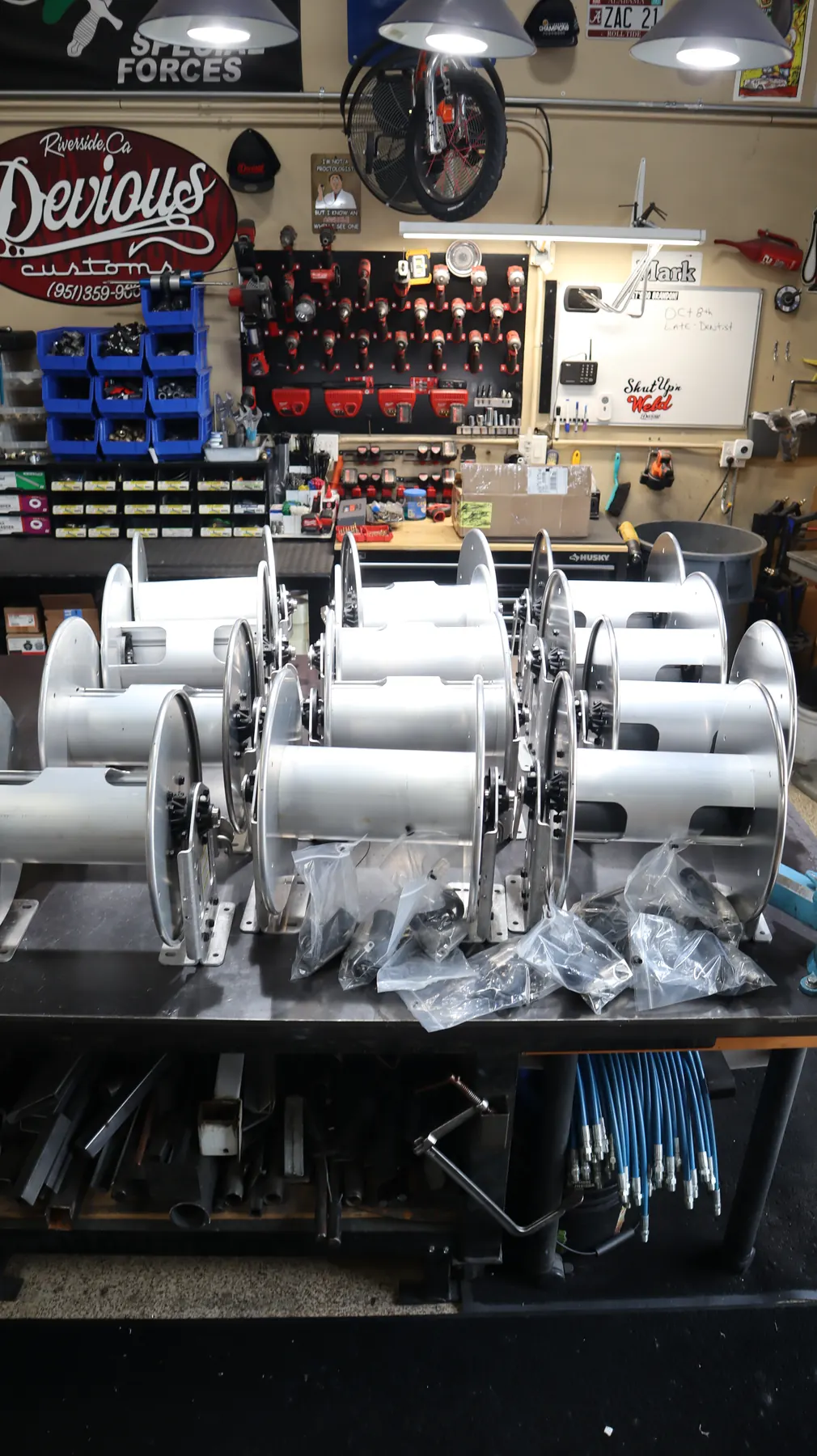 Reelcraft aluminum hose reels on shop table