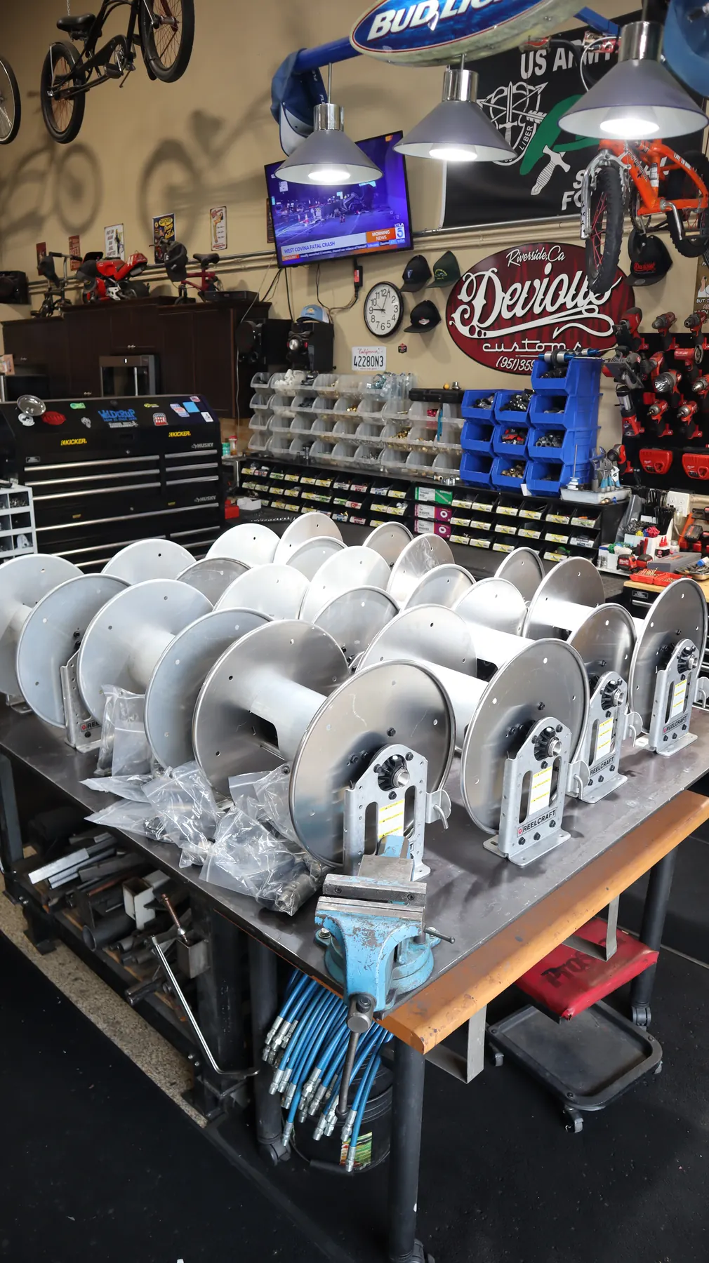 Multiple Reelcraft aluminum hose reels